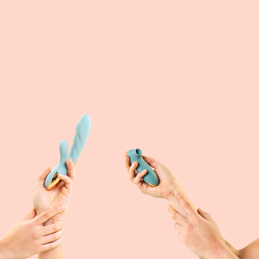 Compact clit sucker with powerful and quiet vibration and a warming rabbit vibrator