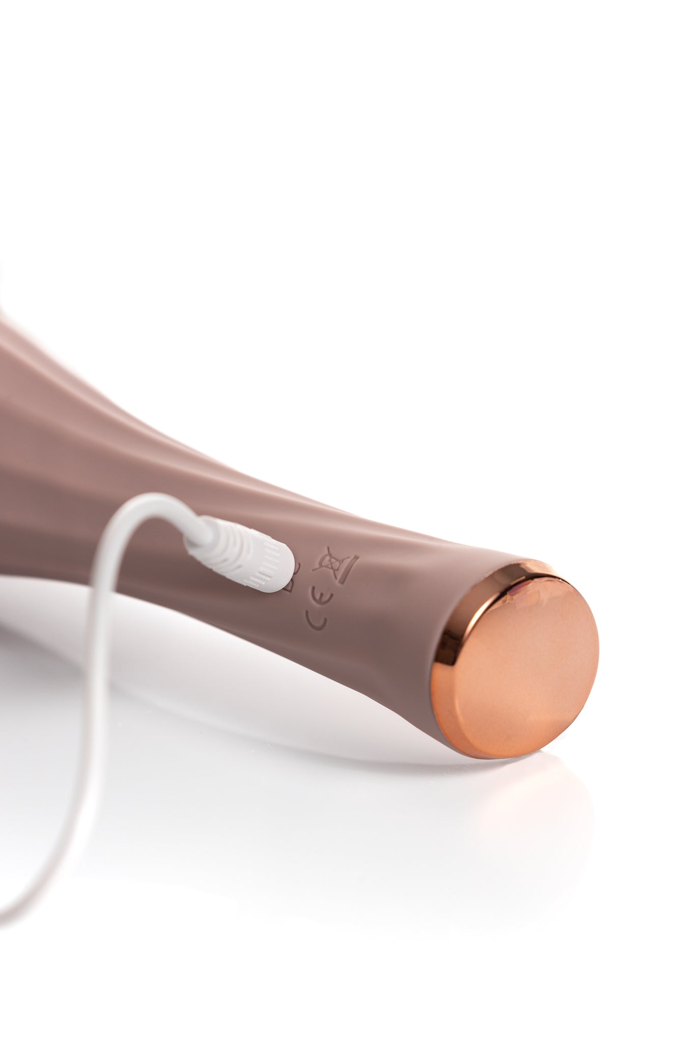 Showing recharge port and how to connect on wand vibrator